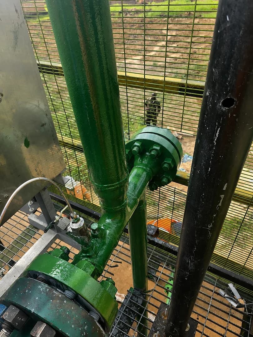 Fabrication and installation of hook up arm